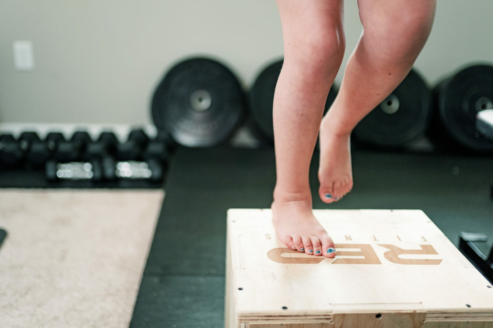 kid doing a box jump